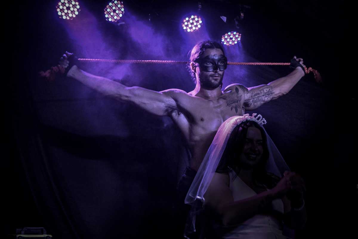 MenXclusive Australia male stripper on stage with bride on her hen's day